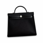 Sophisticated Canvas Carryall: Herbag 31cm Saddle-Inspired Canvas Body with Leather Handle and Shoulder Strap