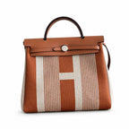 Herbag 31cm Saddle-Inspired Canvas Body with Leather Handle and Shoulder Strap — Polished Canvas-and-Leather Shoulder Style