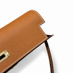 Kelly to go Color: ck37/Gold Size: 19*11.5*1.5cm Leather: Epsom Hardware: Gold Kelly crossbody bag, Golden Brown, cowhide, Gold Buckle, handmade P — Elegant Petite Clutch