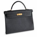 Kelly in Black Togo Leather with Gold Buckle Handmade — Structured Top-Handle Handbag