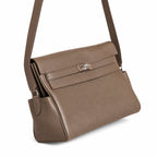 Kelly Messenger messenger bag, large size, pewter gray Togo Leather, Pre-order Togo calfskin messenger bag. - Flap with swivel hardware - Large — Polished Structured Handbag