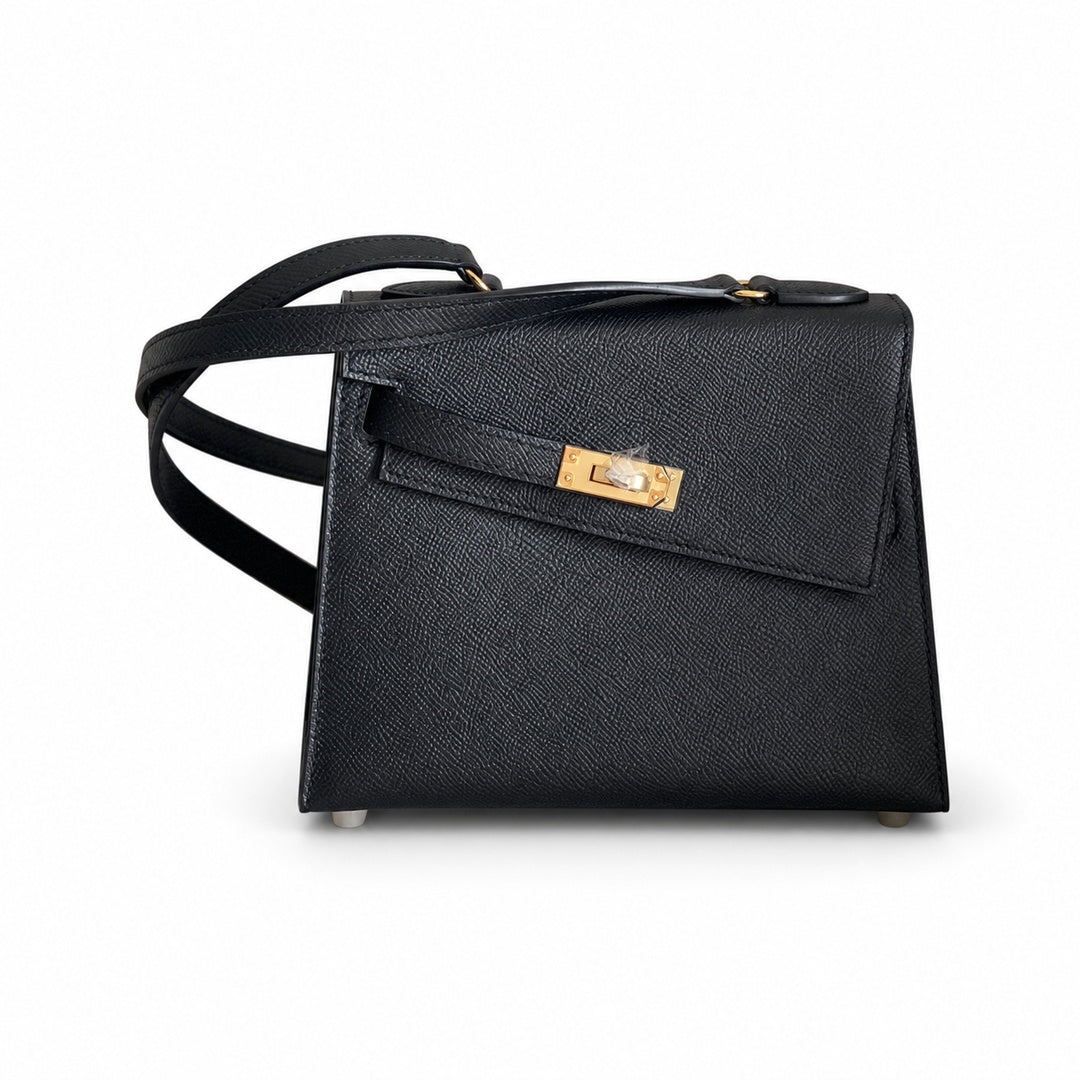 Kelly Double-Sided Epsom Leather in Black with Gold Buckle — Refined Reversible Carry Design