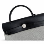 Herbag 31cm Saddle-Inspired Canvas Body with Leather Handle and Shoulder Strap — Elegant Canvas-and-Leather Bag