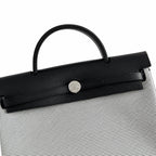 Structured Canvas Shoulder Bag with Leather Trim: Herbag 31cm Saddle-Inspired Canvas Body with Leather Handle and Shoulder Strap