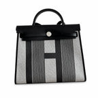 Saddle-Inspired Canvas Bag: Herbag 31cm Saddle-Inspired Canvas Body with Leather Handle and Shoulder Strap