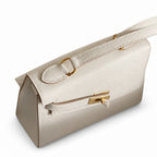 Kelly Double-Sided Epsom Leather in Milkshake White with Gold Buckle — Refined Reversible Carry Design