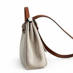 Canvas Shoulder Bag with Leather Accents: Herbag 31cm Saddle-Inspired Canvas Body with Leather Handle and Shoulder Strap