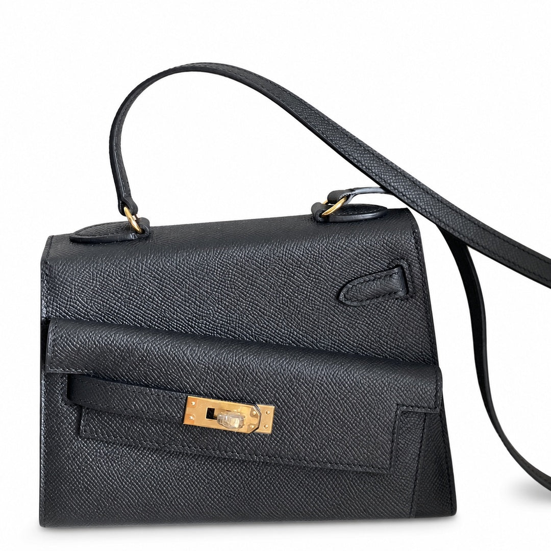 Kelly Double-Sided Epsom Leather in Black with Gold Buckle — Refined Reversible Carry Design
