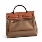 Herbag 31cm Saddle-Inspired Canvas Body with Leather Handle and Shoulder Strap — Structured Leather-Trimmed Canvas Carryall