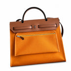Polished Canvas-and-Leather Handbag: Herbag 31cm Saddle-Inspired Canvas Body with Leather Handle and Shoulder Strap