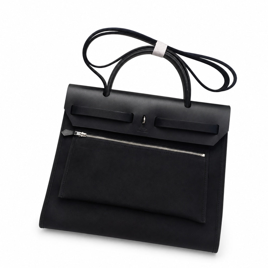 Refined Saddle-Inspired Carry Design: Herbag 31cm Saddle-Inspired Canvas Body with Leather Handle and Shoulder Strap