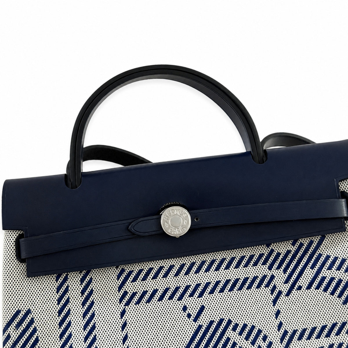 Distinctive Leather-Trimmed Canvas Design: Herbag 31cm Saddle-Inspired Canvas Body with Leather Handle and Shoulder Strap