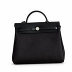 Classic Canvas-and-Leather Shoulder Carry: Herbag 31cm Saddle-Inspired Canvas Body with Leather Handle and Shoulder Strap