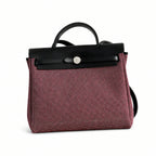 Herbag 31cm Saddle-Inspired Canvas Body with Leather Handle and Shoulder Strap — Distinctive Leather-Trimmed Canvas Design