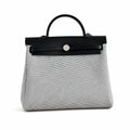 Structured Canvas Shoulder Bag with Leather Trim: Herbag 31cm Saddle-Inspired Canvas Body with Leather Handle and Shoulder Strap