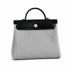 Structured Canvas Shoulder Bag with Leather Trim: Herbag 31cm Saddle-Inspired Canvas Body with Leather Handle and Shoulder Strap