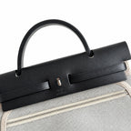 Versatile Canvas Shoulder Carry: Herbag 31cm Saddle-Inspired Canvas Body with Leather Handle and Shoulder Strap