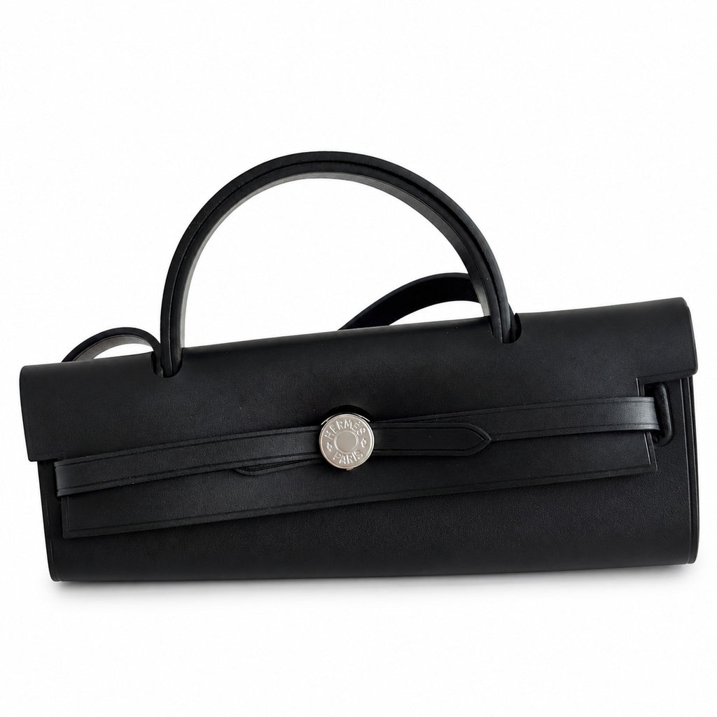 Saddle-Influenced Canvas Hand-Carry Style: Herbag 31cm Saddle-Inspired Canvas Body with Leather Handle and Shoulder Strap