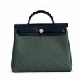 Herbag 31cm Saddle-Inspired Canvas Body with Leather Handle and Shoulder Strap — Elegant Canvas-and-Leather Hand-Carry Bag