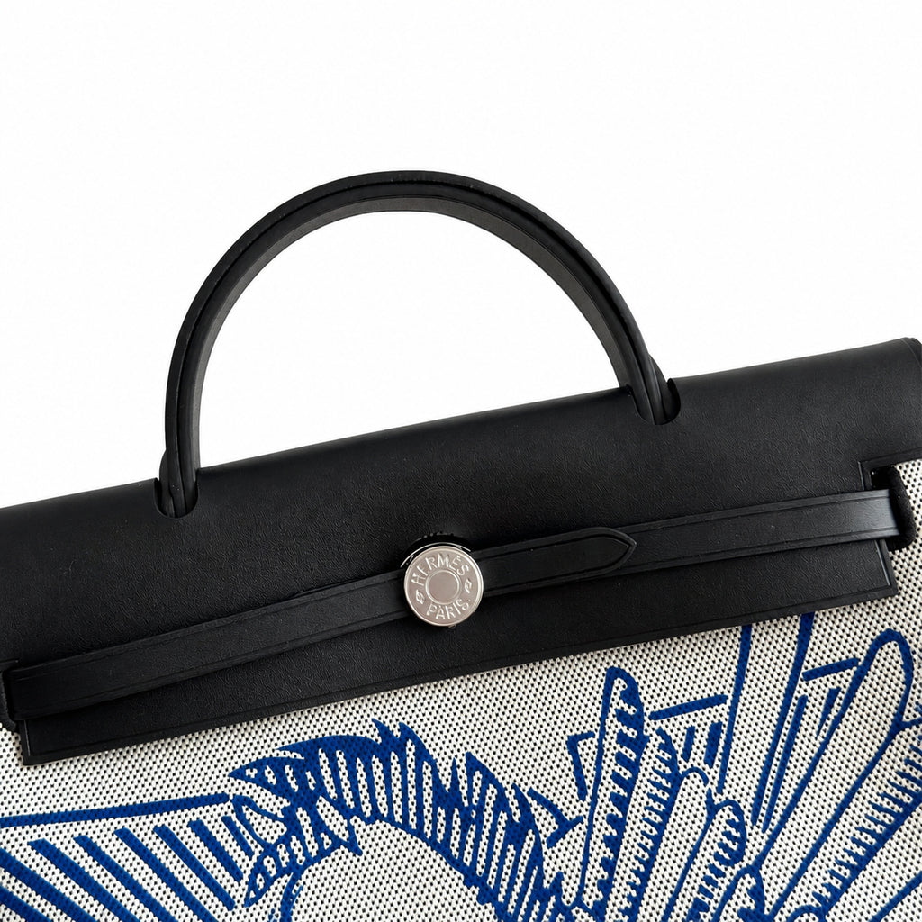 Herbag 31cm Saddle-Inspired Canvas Body with Leather Handle and Shoulder Strap — Refined Canvas Body with Leather Details
