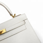 Kelly 25 Milkshake White Epsom Gold Buckle handmade with wax thread — Distinctive Hand-Carry Bag
