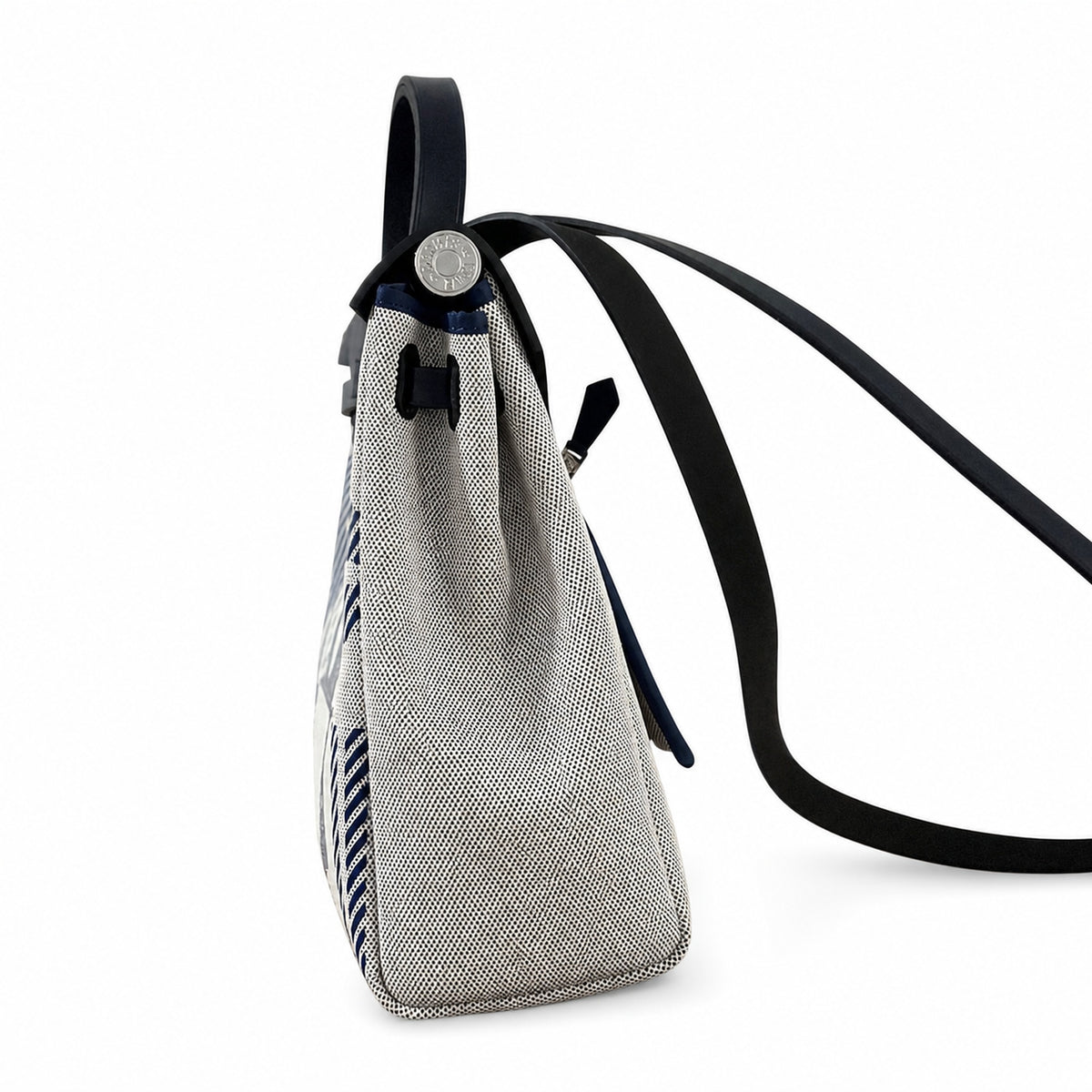 Distinctive Leather-Trimmed Canvas Design: Herbag 31cm Saddle-Inspired Canvas Body with Leather Handle and Shoulder Strap