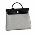 Herbag 31cm Saddle-Inspired Canvas Body with Leather Handle and Shoulder Strap — Elegant Canvas-and-Leather Bag
