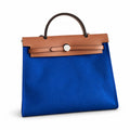 Distinctive Canvas Carry Style: Herbag 31cm Saddle-Inspired Canvas Body with Leather Handle and Shoulder Strap