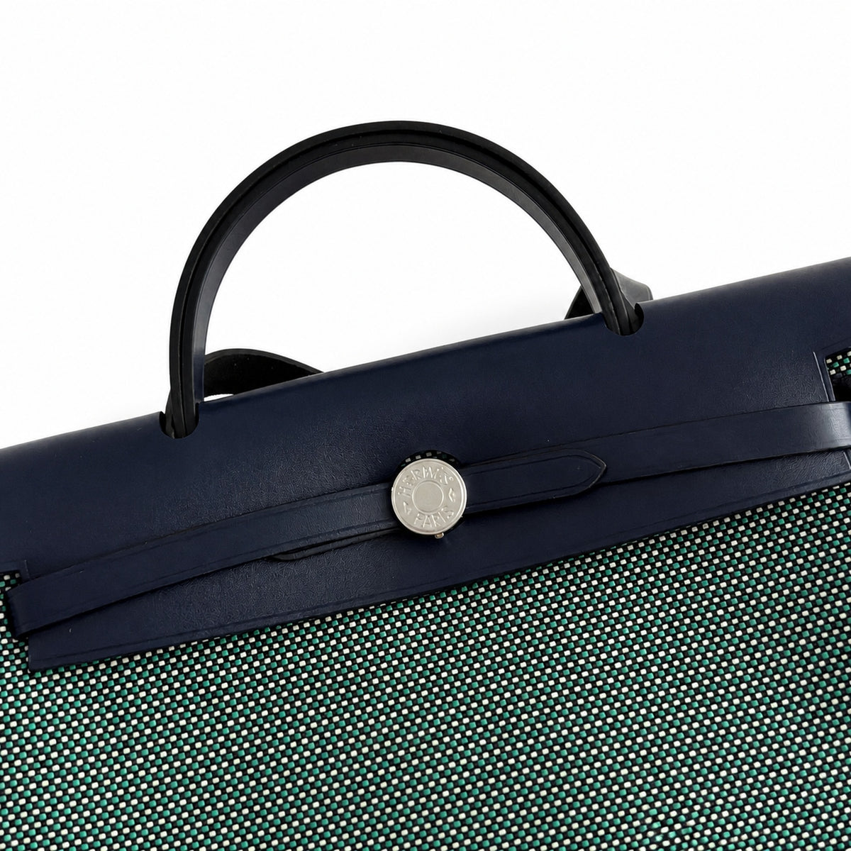 Herbag 31cm Saddle-Inspired Canvas Body with Leather Handle and Shoulder Strap — Elegant Canvas-and-Leather Hand-Carry Bag