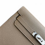 Streamlined Clutch Bag: Kelly Depeches 25cm Togo Leather with Shoulder Strap