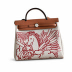 Timeless Leather-Accented Canvas Carry: Herbag 31cm Saddle-Inspired Canvas Body with Leather Handle and Shoulder Strap