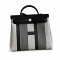 Polished Saddle-Inspired Carryall: Herbag 31cm Saddle-Inspired Canvas Body with Leather Handle and Shoulder Strap