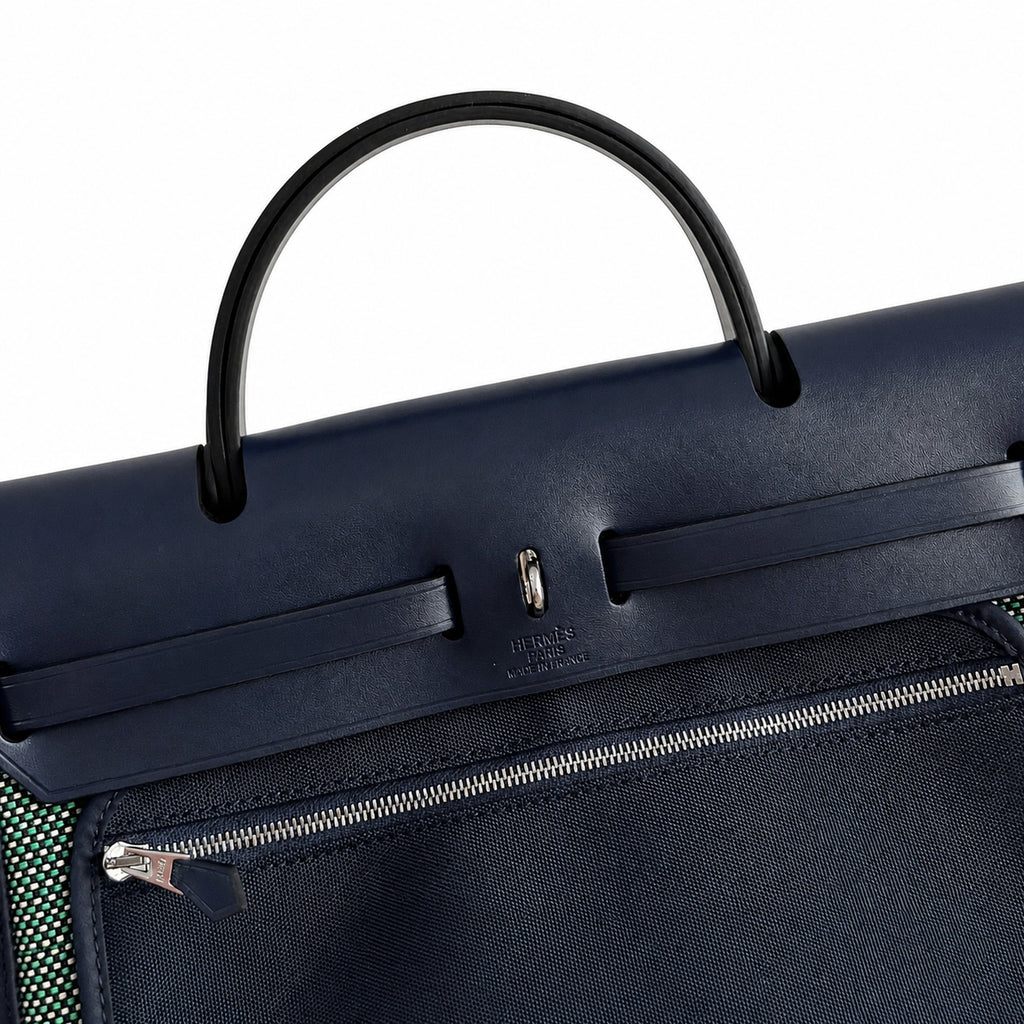 Herbag 31cm Saddle-Inspired Canvas Body with Leather Handle and Shoulder Strap — Elegant Canvas-and-Leather Hand-Carry Bag