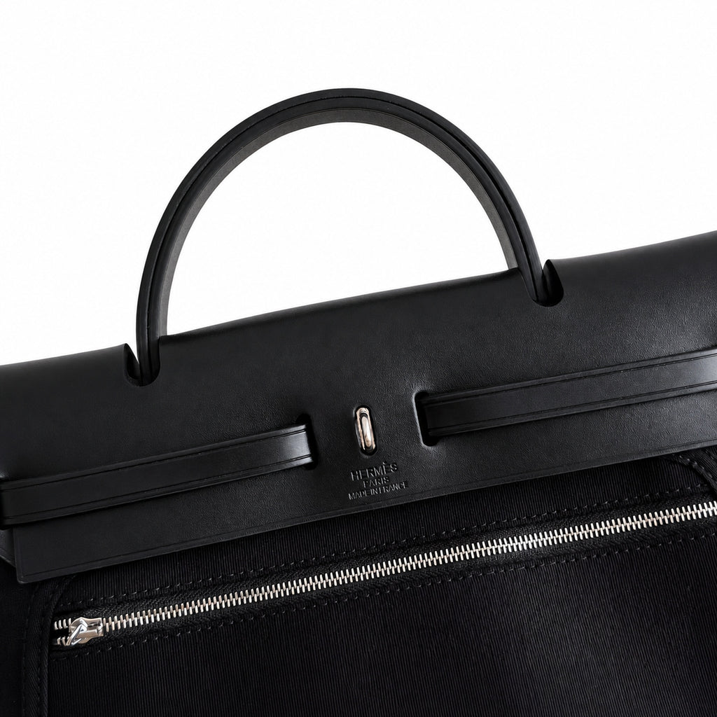 Sophisticated Canvas Carryall: Herbag 31cm Saddle-Inspired Canvas Body with Leather Handle and Shoulder Strap