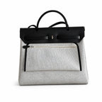Herbag 31cm Saddle-Inspired Canvas Body with Leather Handle and Shoulder Strap — Saddle-Influenced Canvas Hand-Carry Style