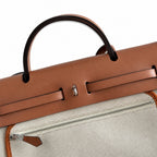 Polished Canvas-and-Leather Shoulder Style: Herbag 31cm Saddle-Inspired Canvas Body with Leather Handle and Shoulder Strap