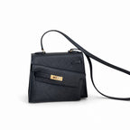 Kelly Double-Sided Epsom Leather in Black with Gold Buckle — Refined Reversible Carry Design