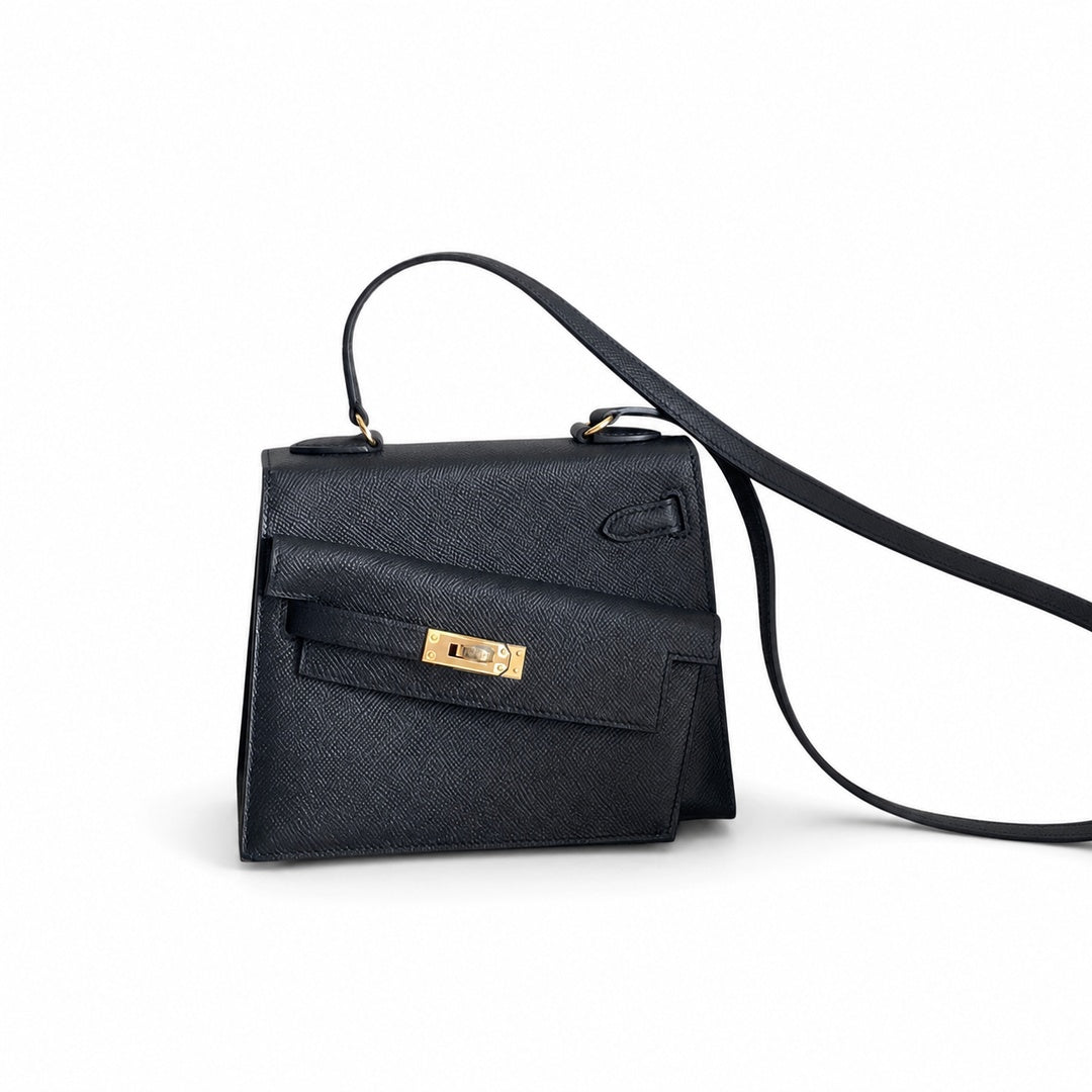 Kelly Double-Sided Epsom Leather in Black with Gold Buckle — Refined Reversible Carry Design