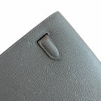 Sophisticated Compact Carry: Kelly Depeches 25cm Togo Leather with Shoulder Strap