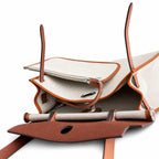 Canvas Body and Leather Trim Design: Herbag 31cm Saddle-Inspired Canvas Body with Leather Handle and Shoulder Strap