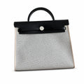Versatile Canvas Shoulder Carry: Herbag 31cm Saddle-Inspired Canvas Body with Leather Handle and Shoulder Strap