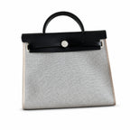 Versatile Canvas Shoulder Carry: Herbag 31cm Saddle-Inspired Canvas Body with Leather Handle and Shoulder Strap