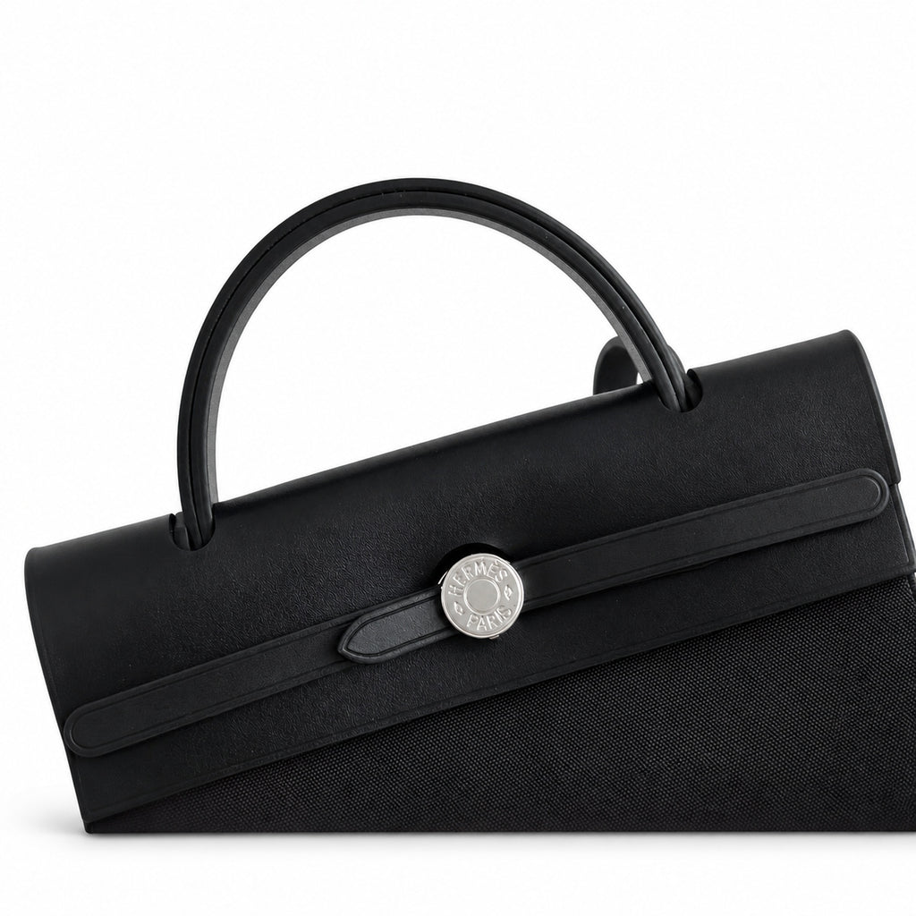 Classic Canvas-and-Leather Shoulder Carry: Herbag 31cm Saddle-Inspired Canvas Body with Leather Handle and Shoulder Strap